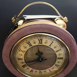 Real clock purse with crossbows strap